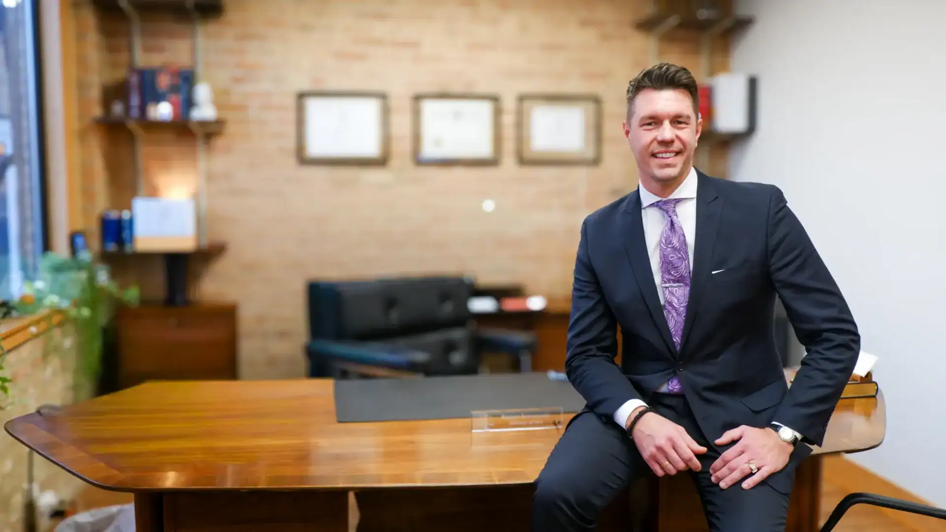 Borjan Kovacevic Attorney at Law sitting on a desk